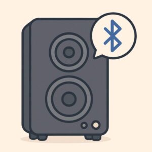 【最新】BluetoothスピーカーでPCの音が出ない!原因と今すぐできる解決法 2 Bluetooth接続を示す吹き出しが表示された、黒いスタンド型Bluetoothスピーカーのイラスト。2つのスピーカーユニットとシンプルなボタンが描かれている。